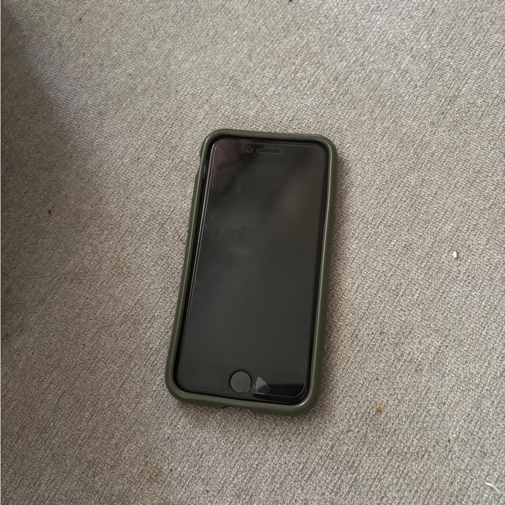 Apple Black Phone with Green Case
